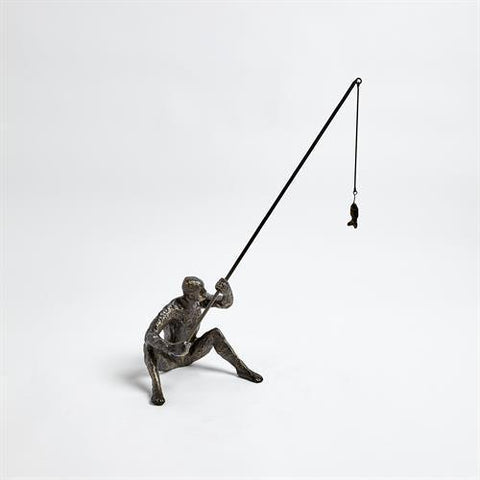 Reel It In sculpture(تمثال لصياد يحمل صنارة)